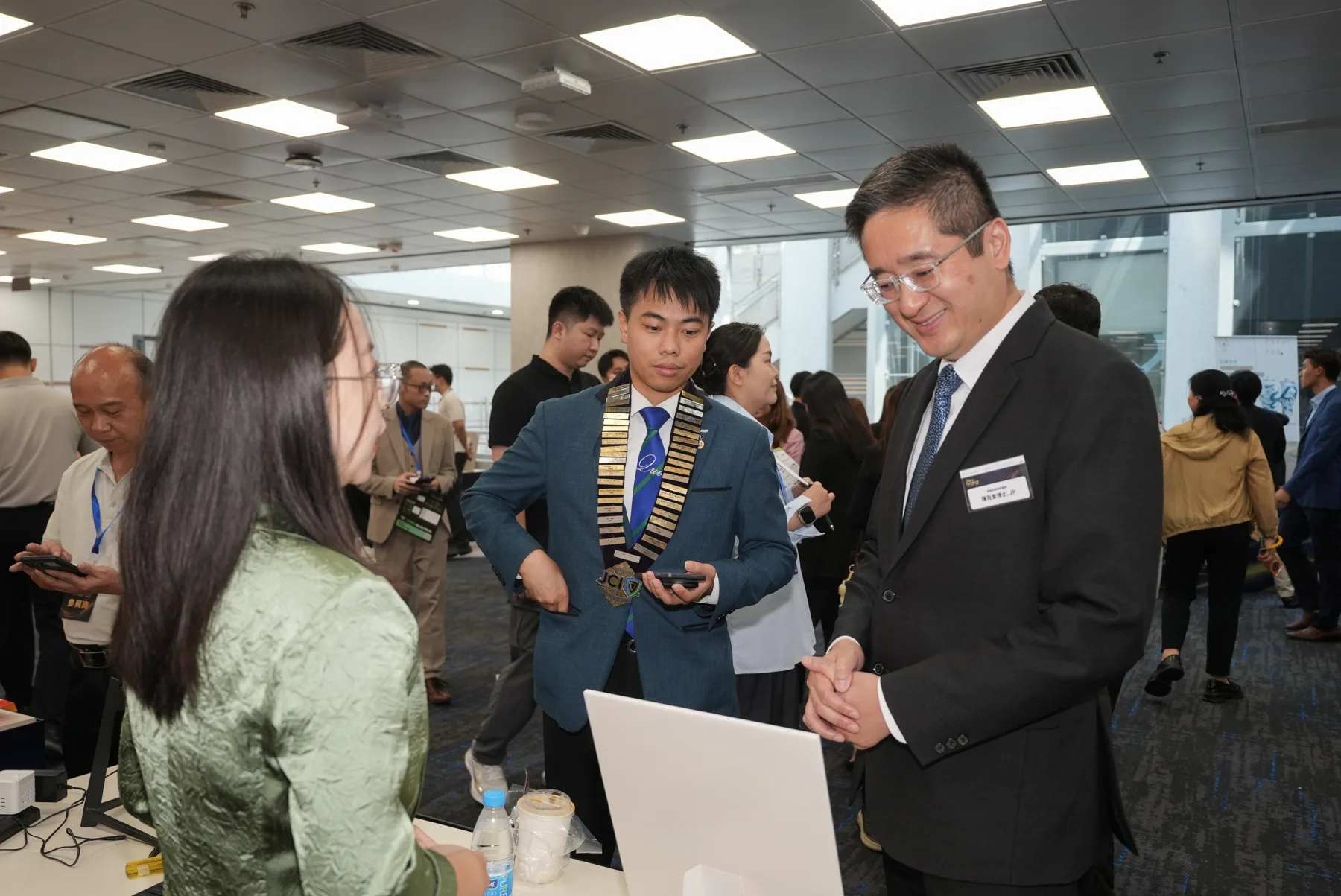 Guests exchanging ideas at the 2026 Extraordinary Branding Awards brand expo.