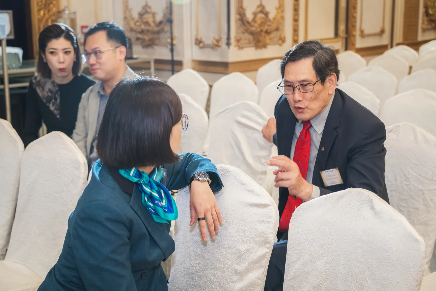 Members and guests connecting at the AGM · 62/100