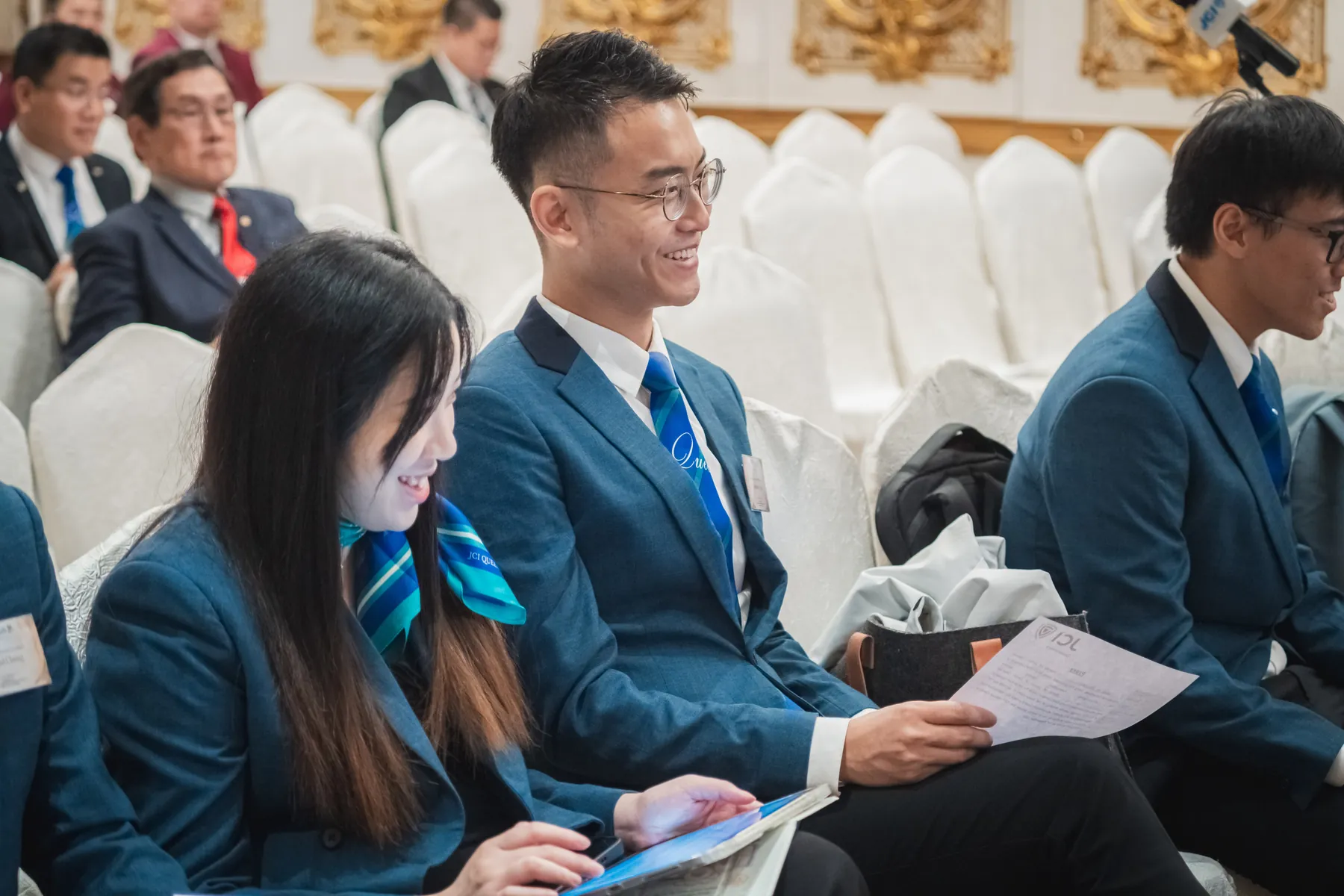 Members and guests connecting at the AGM · 64/100