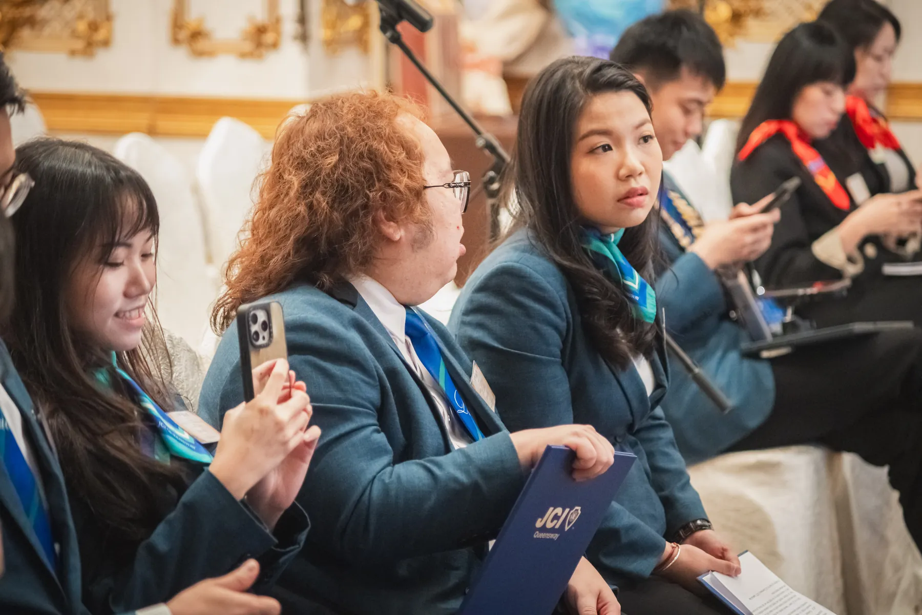 Members and guests connecting at the AGM · 70/100
