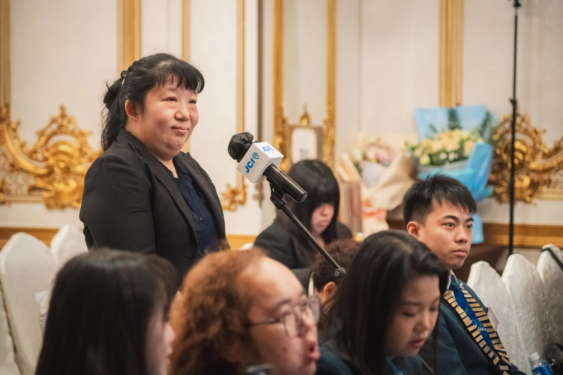 Members and guests connecting at the AGM · 74/100