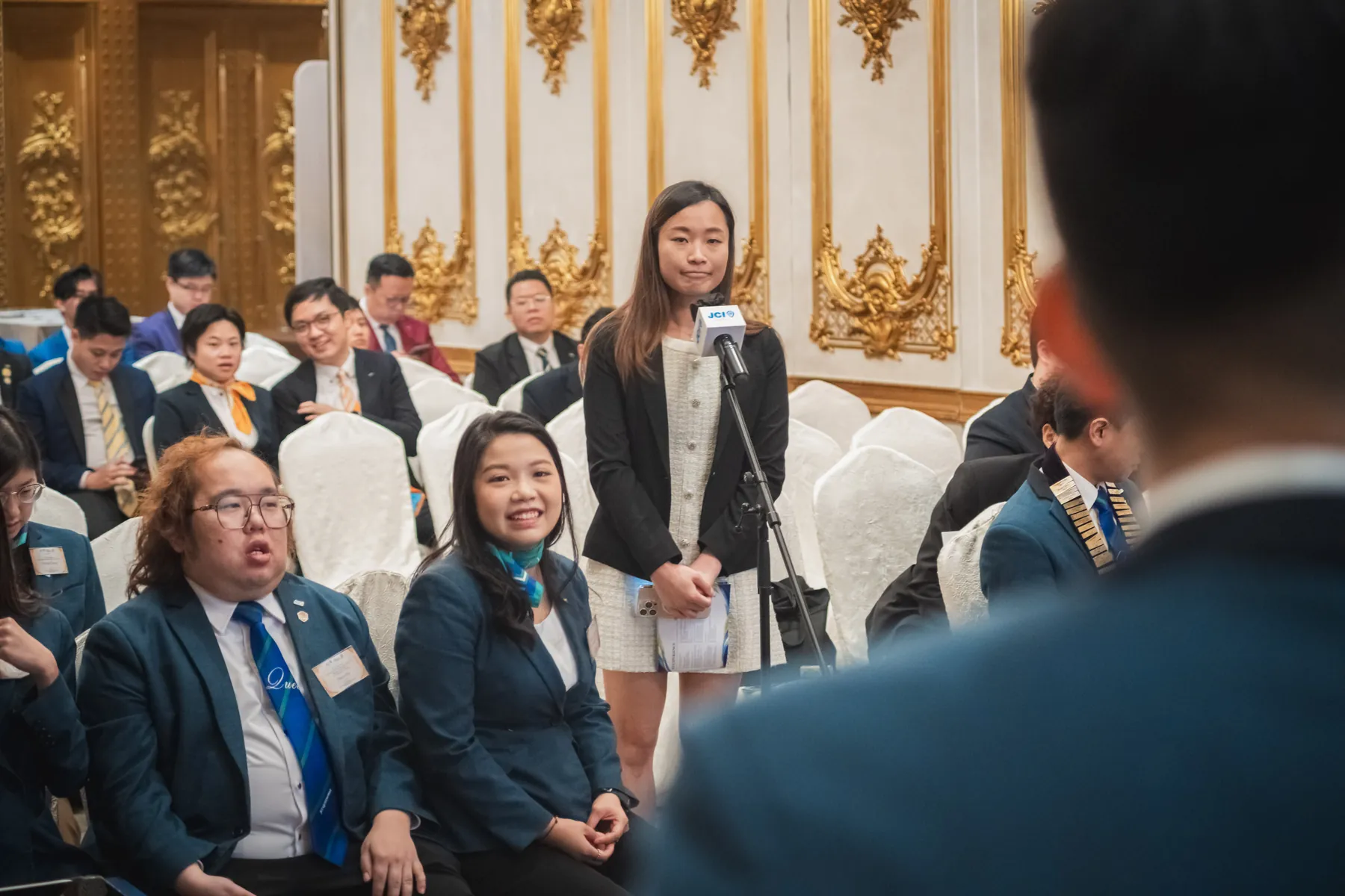Members and guests connecting at the AGM · 77/100