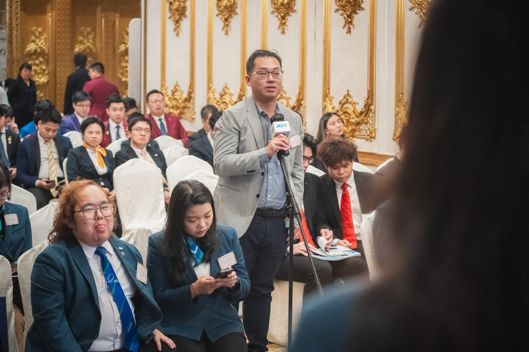 Members and guests connecting at the AGM · 80/100